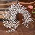 Detailed close-up of handmade bridal headband with pearls and crystals on silk background - Silver 3