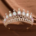 Detail of luxury gold bridal tiara with AB rhinestones on premium brown satin background - Colorful Zirconia
