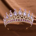 Macro view of purple teardrop crystal embellishments on the gold alloy wedding tiara - Gold Purple