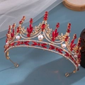 Golden bridal crown with vibrant red crystals and white pearls on light blue background - Leaf Pearl Red Marquise Style (661)