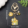 Goldener Schlüsselanhänger mit gelber Sonnenblume und Biene, Gesamtlänge 8,5 cm - Chrysantheme Biene Haus (ER1751)