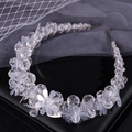 Elegant hand-woven crystal bridal headband with white beaded flowers on a thin metal frame - White