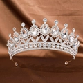Silver bridal tiara with sparkling pear-shaped crystals on dark satin background - Silver