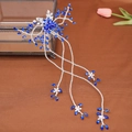 Exquisiter Brauthaarkamm mit königsblauen Strasssteinen und langen Quasten für Hochzeiten - Blau