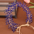 Handgemaakte gouden haarband met koningsblauwe kristallen en zijden linten - Blauw