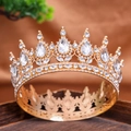 Macro detail of a vintage golden wedding crown with teardrop rhinestones and crystals - Gold
