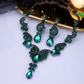 Exquisite bridal jewelry set with emerald green crystals on black metal base - Antique Silver Green