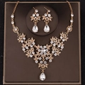 Elegant gold bridal jewelry set with floral crystal necklace and drop earrings - Gold