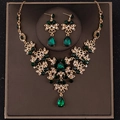 Elegant emerald green and gold bridal jewelry set with pear-cut necklace and earrings - Gold Emerald 2