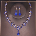 Elegant gold bridal jewelry set with deep blue pear-cut crystals and floral necklace - Gold Blue