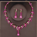 Elegant gold jewelry set with ruby-red teardrop stones and sparkling crystals - Gold Magenta
