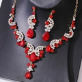 Elegant bridal jewelry set with red pear-shaped gemstones and gold necklace and earrings - Gold Red 2