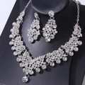 Elegant bridal jewelry set with silver floral necklace and teardrop earrings - Silver All Rhinestone