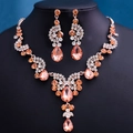 Exquisite bridal jewelry set in rose gold finish with champagne pear-shaped stones - Champagne