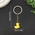 Detailed size view showing the 7.6cm height of this cute resin yellow duck keychain - Yellow (LS48)
