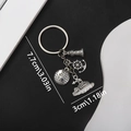 Set portachiavi nautico argento antico con faro, timone, ancora e ciondoli a nave - Stile Nave da Crociera Timone Globo (ER386)
