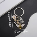 Bienen- und Gänseblümchen-Schlüsselanhänger mit Emaille und Strass, Gesamtlänge 7,2 cm - Emaille Bienenblumen-Stil