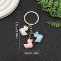 Vue détaillée du porte-clés canards en résine 3D blanc rose et bleu avec dimensions - Ensemble Tricolore 1 (LS51)