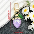Detailed size view of a purple pearlescent strawberry keychain with gold hardware - Solid Purple Strawberry (ER938)