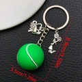 Portachiavi da tennis in silicone verde con ciondolo cheer e dettaglio cuore d'argento - Stile Tennis Verde (ER1531)