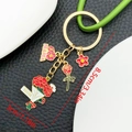 Golden Mother's Day keychain featuring MAMA letters and red carnation floral charms - MAMA Rose Bouquet Style (ER1548)