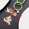 Gold Mother's Day keychain with red carnation, MAMA heart charms, and a white pearl - Carnation Bouquet Heart Style (ER1546)
