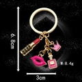 Pink lipstick crown and perfume bottle keychain with golden finish and black glitters - Fashion Makeup Set (LS07)