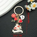 Mother's Day keychain with red daisy and rose charms in elegant gold finish - Enamel Red Flower Envelope Mother's Day Keychain (ER947)