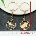 Creative Chinese panda metal keychain in gold finish with size measurements shown - Sleeping on Bamboo Panda (ER1059)
