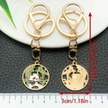 Metal panda keychain with hollow bamboo pattern and polished ray texture finish - Chewing Bamboo Panda (ER1062)