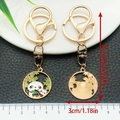 Chinese panda keychain with bamboo charm in gold finish showing front and back view - Mother and Baby Panda (ER1064)