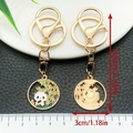 Golden panda keychain with bamboo motif enamel and hollow design, 3.46 inch length - Panda in Bamboo Forest (ER1065)