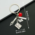 Porte-clés enseignant en alliage de zinc avec breloque 100A+ et petit pomme rouge - Porte-clés Saison Scolaire Stylo Règle Pomme (ER540)