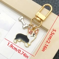 Llavero de corgi esmaltado con colgante de hueso y herrajes dorados elegantes - Perro de Pie Blanco y Negro (LS354)