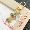 Cute brown poodle keychain with green hat and striped shirt plus small bone charm - Brown Sporty Puppy Style (LS364)