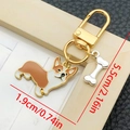 Cute Corgi dog keychain with bone charm and specific size dimensions 1.9x5.5cm - Yellow And White Standing Puppy Style (LS361)