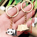 Cute cartoon panda keychain in black and white zinc alloy with a golden metal ring - Drip Oil White Chinese Style Lying Panda Style (ER1035)