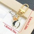 Cartoon Corgi dog enamel keychain with bone charm and gold spring buckle pendant - Black And White Friendly Puppy Style (LS352)