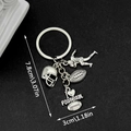 Silver metal rugby keychain with heart charm, player, helmet and football pendants - American Football Series (Antique Silver)