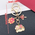 Cartoon zodiac horse keychain with red firecracker and fortune drum pendants - Firecracker Fortune Prosperity Horse
