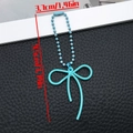 Light blue bow knot pendant with beaded chain and striped texture measuring 3.7x9.5cm - Lake Blue (ER2096)