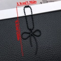 Black painted alloy bowknot pendant with beaded chain charm for DIY phone cases - Black (ER2097)
