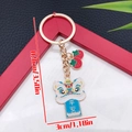 Traditioneller Löwentanz-Schlüsselanhänger mit Pingan-Tag und Erdbeer-Charm-Anhänger - Blauer Sicherer Löwe (ER2150)