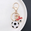 Llavero de fútbol esmaltado con colgantes de balones y placa I Heart Soccer dorada - Estilo Medalla de Fútbol