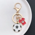 Llavero dorado con colgante de camiseta de fútbol roja y mini balón de fútbol clásico - Estilo Camiseta de Fútbol
