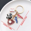 Baseball keychain with red and blue enamel charms including glove and helmet - Sports Series Baseball Gear Style (ER875)