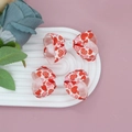 Close-up of two heart-printed ribbon bow hair clips on a white decorative display plate - Sweet Heart Pattern Pair (06#)