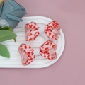 Close-up of two white grosgrain ribbon hair bows with red heart prints on a display tray - Fresh Heart Pattern Pair (07#)