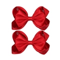 Detail view of 4-inch red satin polyester hair bows for girls with silky glossy finish - Red