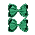 Detailed view of 4-inch solid green grosgrain ribbon bow clips with elegant satin texture - Green